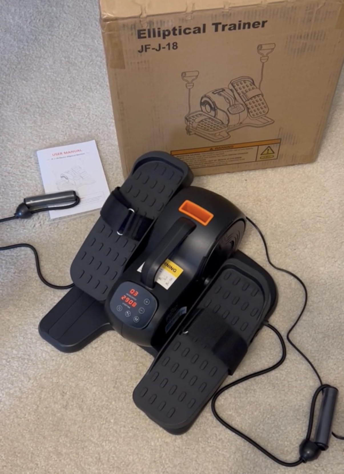 Dripex customer photo — under desk elliptical in use